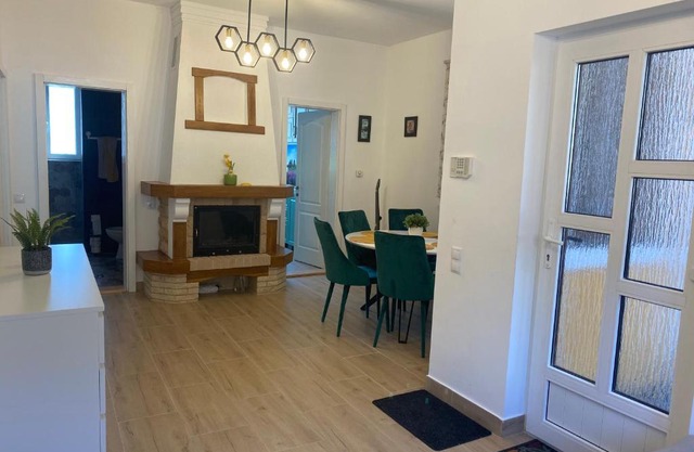 Central cheerful house with yard