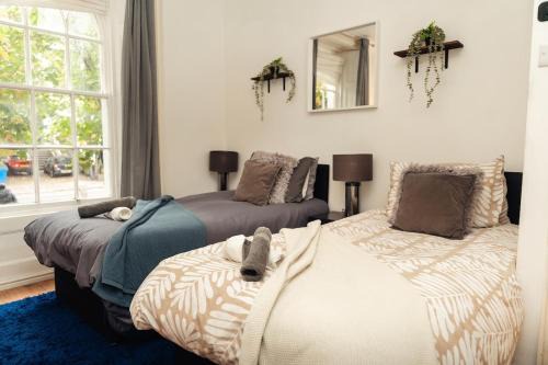 Central City Oasis - Sleeps 4 Parking Included Contractor Discounts!