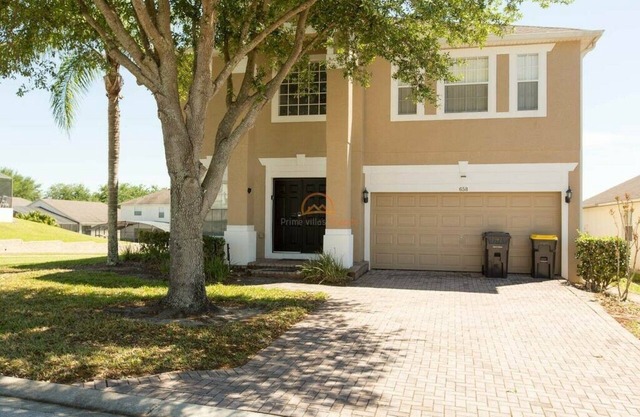 Centrally located 4BR/3BA with South Facing Pool