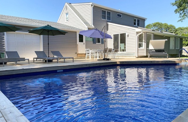 Centrally located, newly renovated and furnished 4 bed/4 bath + heated pool