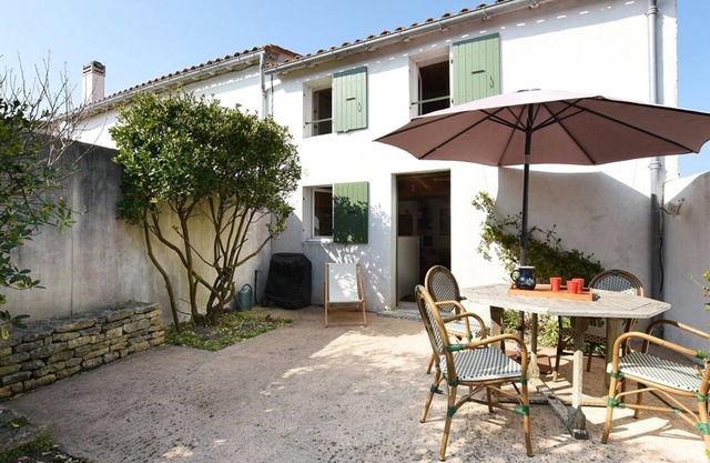 Charming Village House with Garden near Beach - 2BR, Modern Amenities, BBQ & Parking