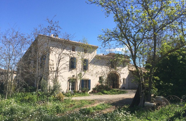 Character building on large wooded grounds with private garden.