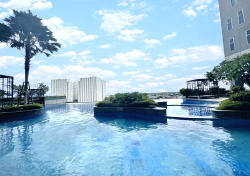 Charming 2BR Apartment at Amor Pakuwon City Mall East Surabaya by Le Ciel Hospitality