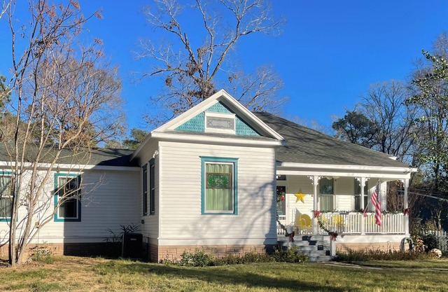 Charming 4-bedroom farmhouse in Magnolia nestled on 2 acres. Miniature horses!