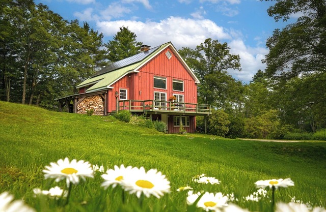 Charming barn ski house with exposed rustic beams and cathedral ceilings.