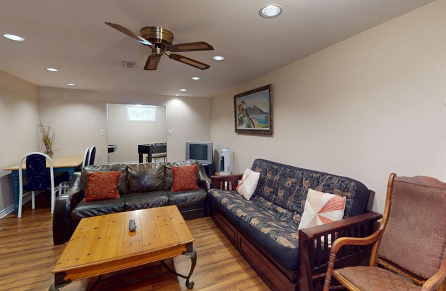 Charming bungalow steps to beach, fireplace, with deck & game room