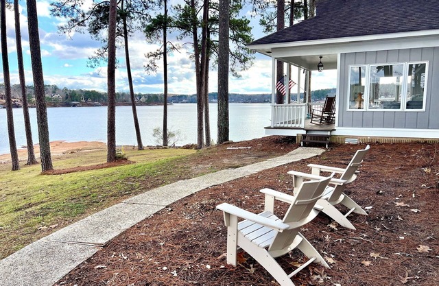 Charming Cottage with Stunning Point Views, Flat Lot, Walk-in Water, and a Dock!