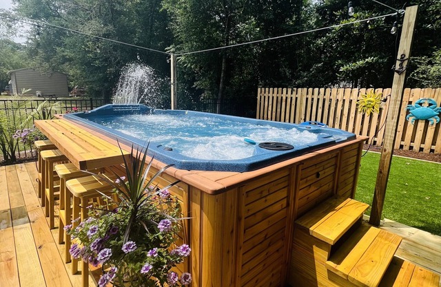 Charming home in Southport Center with large heated swim spa.