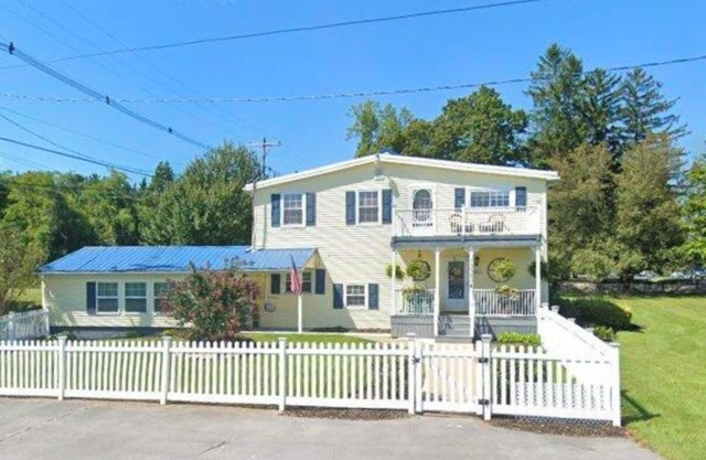 Charming in-law suite. The open-concept living area welcomes you.