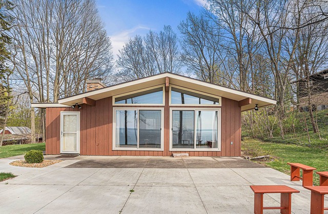 Charming lakefront home with patio, stellar views, washer/dryer, and central AC