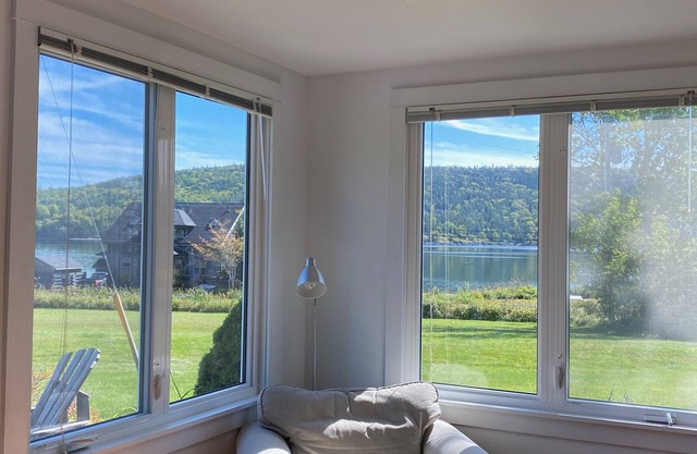 Charming Modern Cottage with water views and private Spa. Quiet Coastal Location