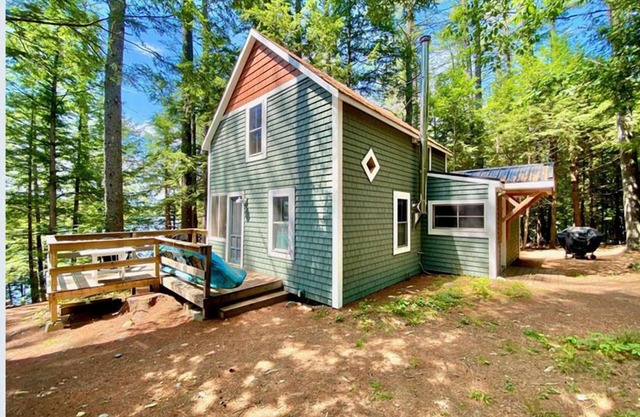 Charming, peaceful Maranacook waterfront camp nestled in the pines