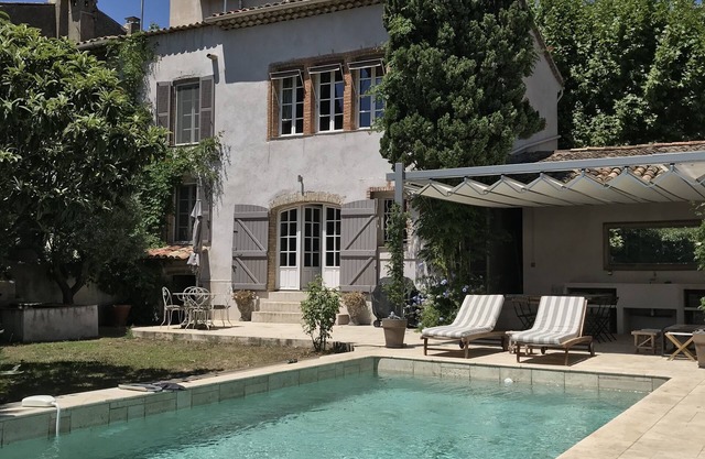 Charming property nestled in an adorable village with private garden and pool.