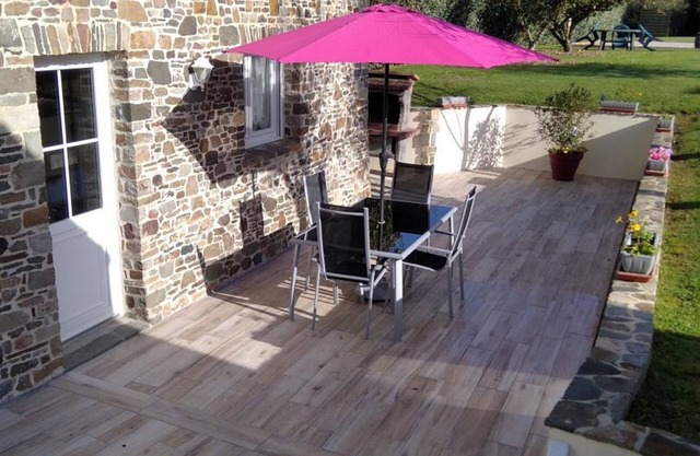 Charming Stone House with Fireplace, Large Garden, and Car Charging in Coastal Village