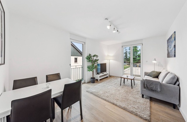 Chic and modern home in new building with 2 balconies