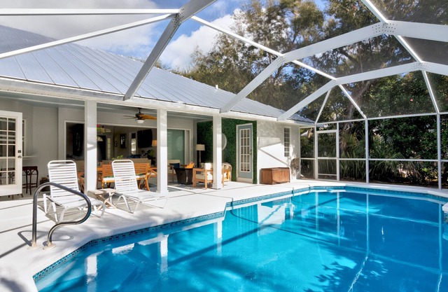 Chic Beach Bungalow Steps from Sand + Pool, Hot Tub, Bikes & Rocket Views!