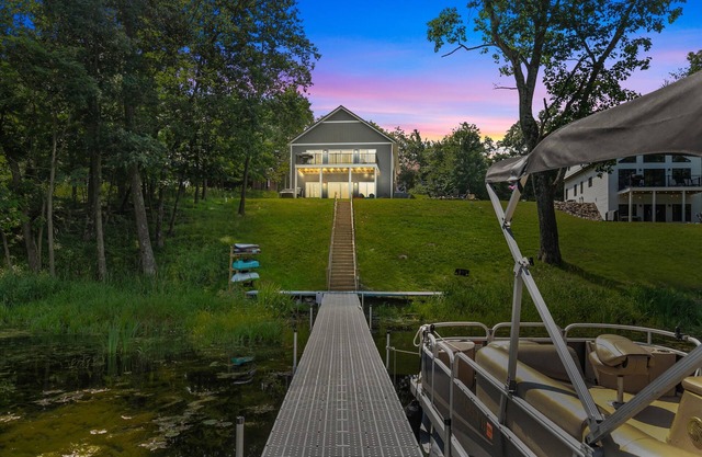 Chic Lakefront Escape- Hot Tub, Pier, & Kayaks