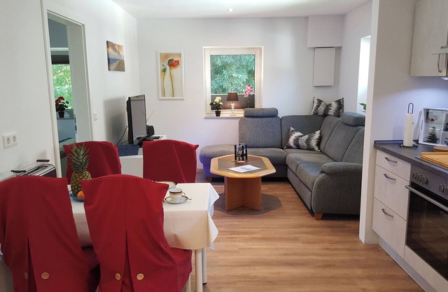 Chic vacation home, nestled in the beautiful Schleil landscape, equipped with: Baby crib, garden area with play facilities and covered barbecue and smoking area, fly screens and pleated blinds on all windows, flat screen TV, open plan kitchen with.