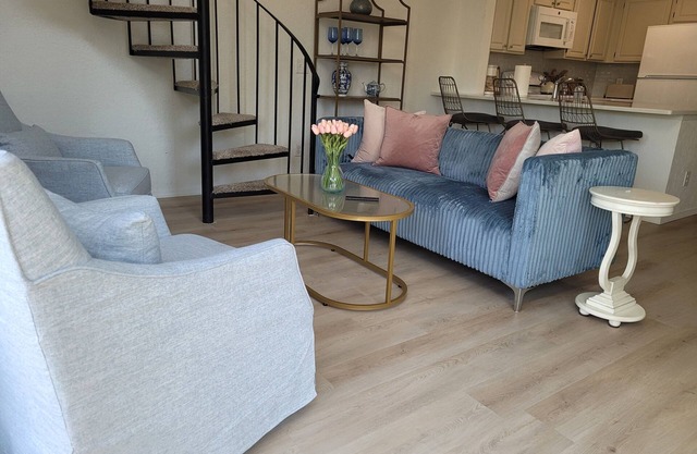 Chic, well-appointed 1-bedroom poolside condo with loft