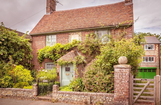 Chocolate-box pretty Pear Tree Cottage in South Downs village