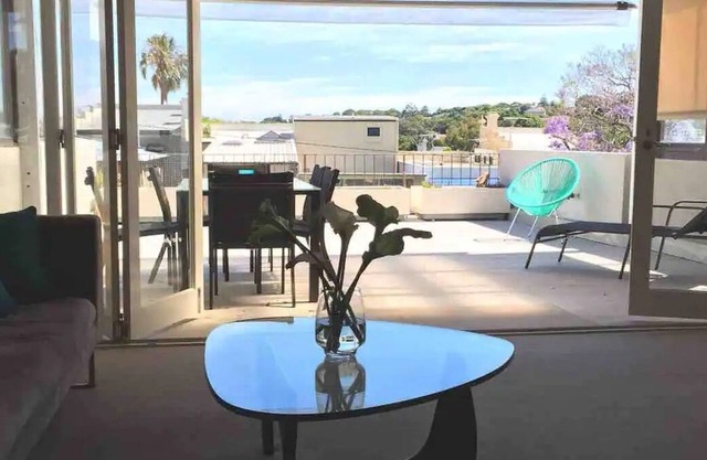 City sanctuary with large deck and views to die for!