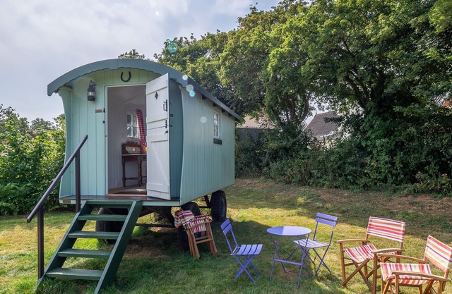 Clarabelle is a beautiful shepherd's hut set in a blooming kitchen garden