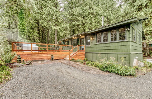 Classic forest cabin on Still Creek with private hot tub & wood fireplace