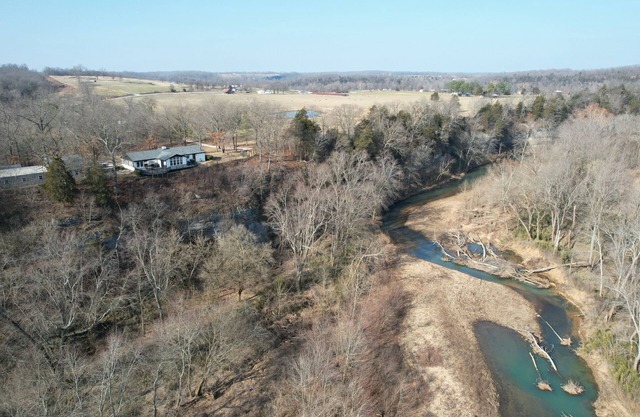 Cliffs Edge Guest House- 2 bedroom cabin with War Eagle Creek Views and cave
