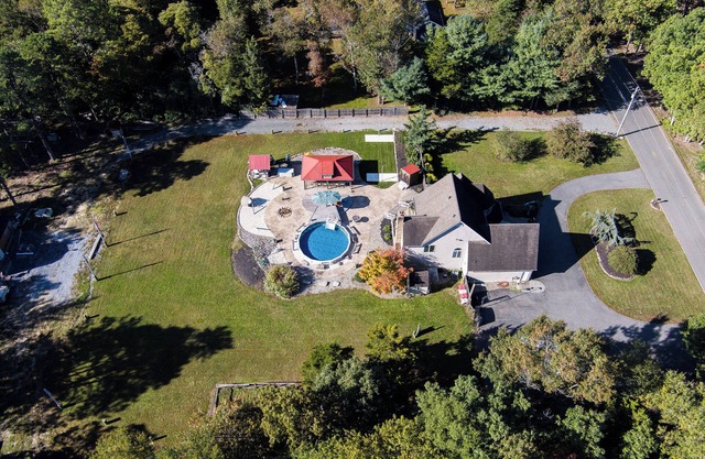ClubDivot - A Modern Farm Style Home with Pool and Backyard Bar