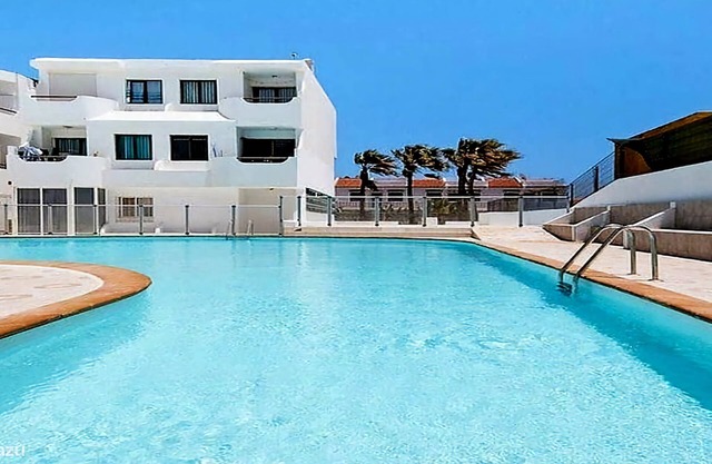 Coastal Apartment Ocean Breeze Caleta with Sea View