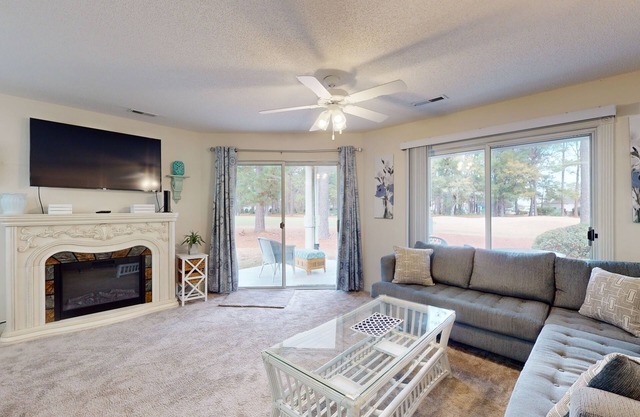 Coastal Condo with golf on-site, shared pool and fitness center