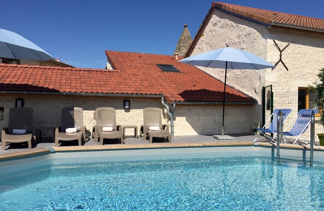 Collection of boutique cottages around a courtyard with pool & garden, sleeps 15