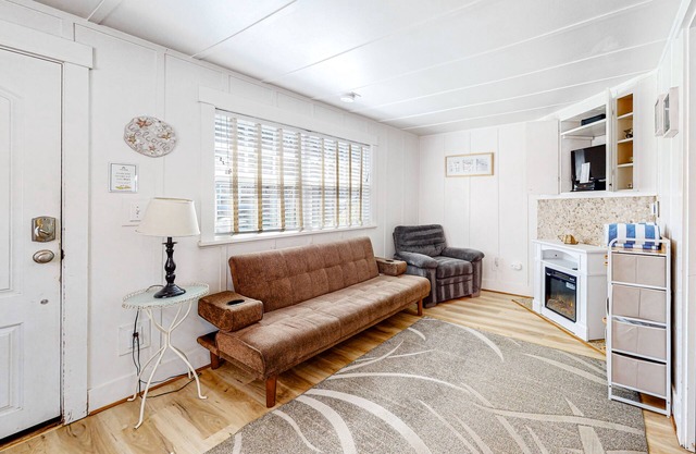 Colorful, Dog-Friendly Cottage with Free WiFi, Fireplace - Near Beach & Town
