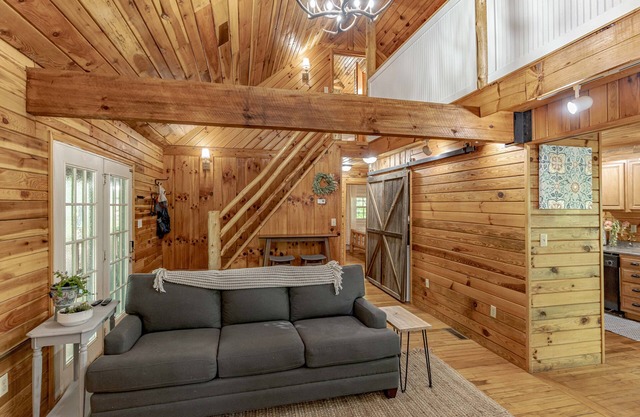 Come relax in our cozy cottage nestled in the woods overlooking Lake Millie.