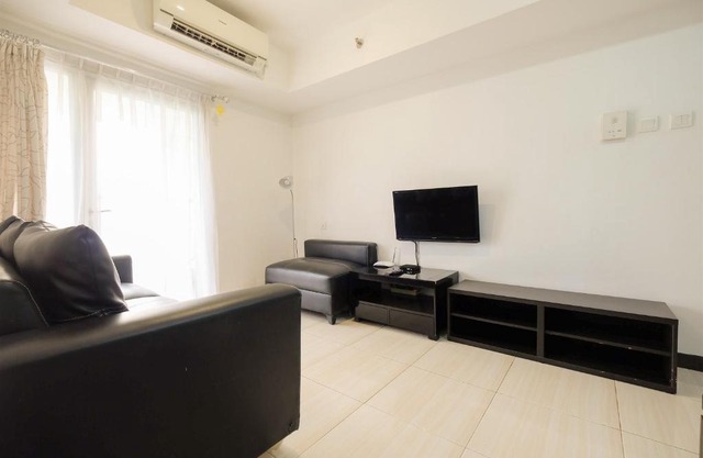 Comfortable 2BR The Wave Apartment near Epicentrum Kuningan by Travelio