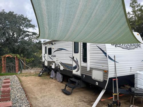 Comfortable Guest RV With EV charger Semi Rural Area