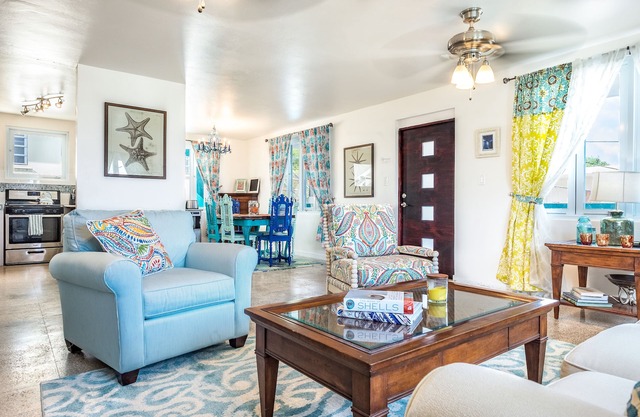 "Comfortable, modernized 5BR 4BA Home with an amazing Ocean View and breeze!