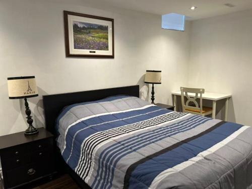 Comfortable Two Bedroom Basement Suite with Full Kitchen Bathroom and Queen Beds