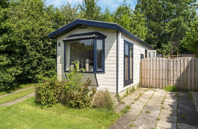 Comfy chalet in Blokzijl with waterside garden