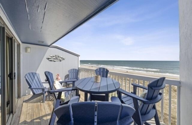Conched Out - Feel the ocean breezes as you relax on the deck overlooking the lovely Carolina Beach coastline by RedAwning