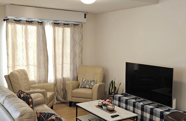 Condo-townhouse with complementary parking and close to highway