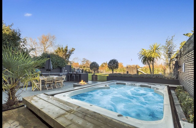 Contemporary Barn with Heated Hydro Pool