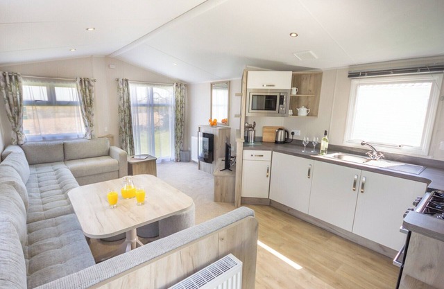 Contemporary caravan with one double and one twin.