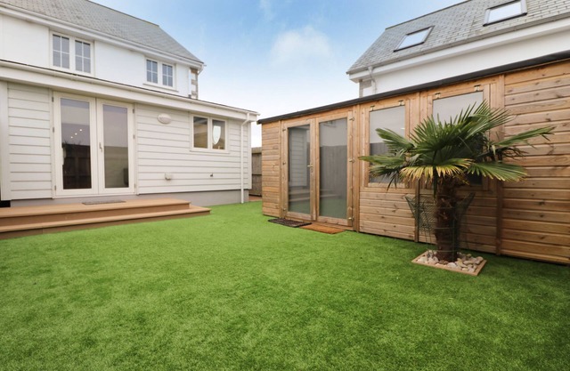 Contemporary house, lovely village location, close to beaches.