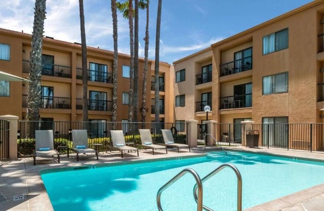 Convenience & Comfort! Pets Allowed, with Private Parking & Outdoor Pool