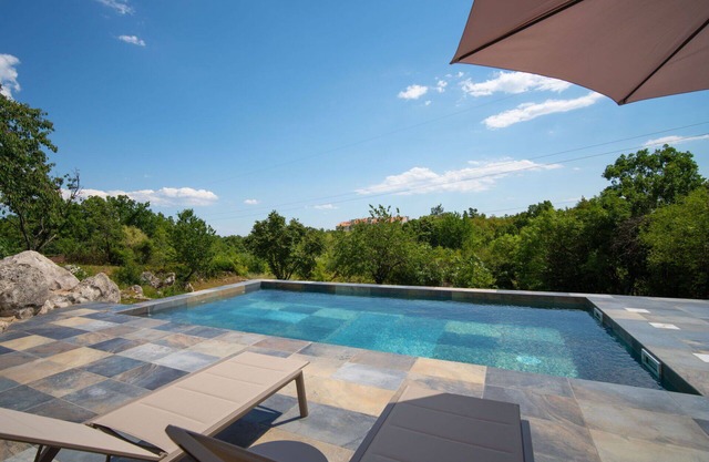 Cosy apartment for 4 people with A/C, WIFI, pool, TV, terrace and panoramic view