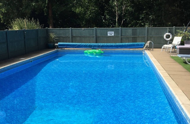 Cosy ground floor pet friendly Saxony studio with gardens and pool near Cromer