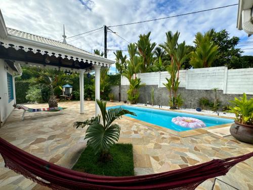 Cottage Palmier Rouge