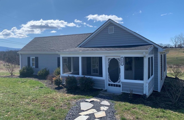 Country cottage beside stocked pond on 40 acres and Blue ridge Mountain View