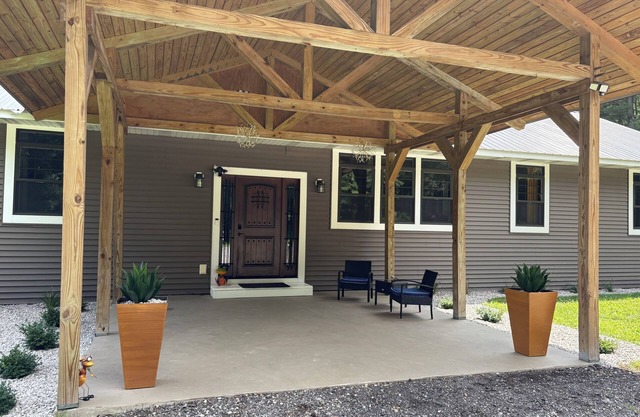 Countryside Escape, 4 bedrooms and 2 baths, sits on the 10 acres.